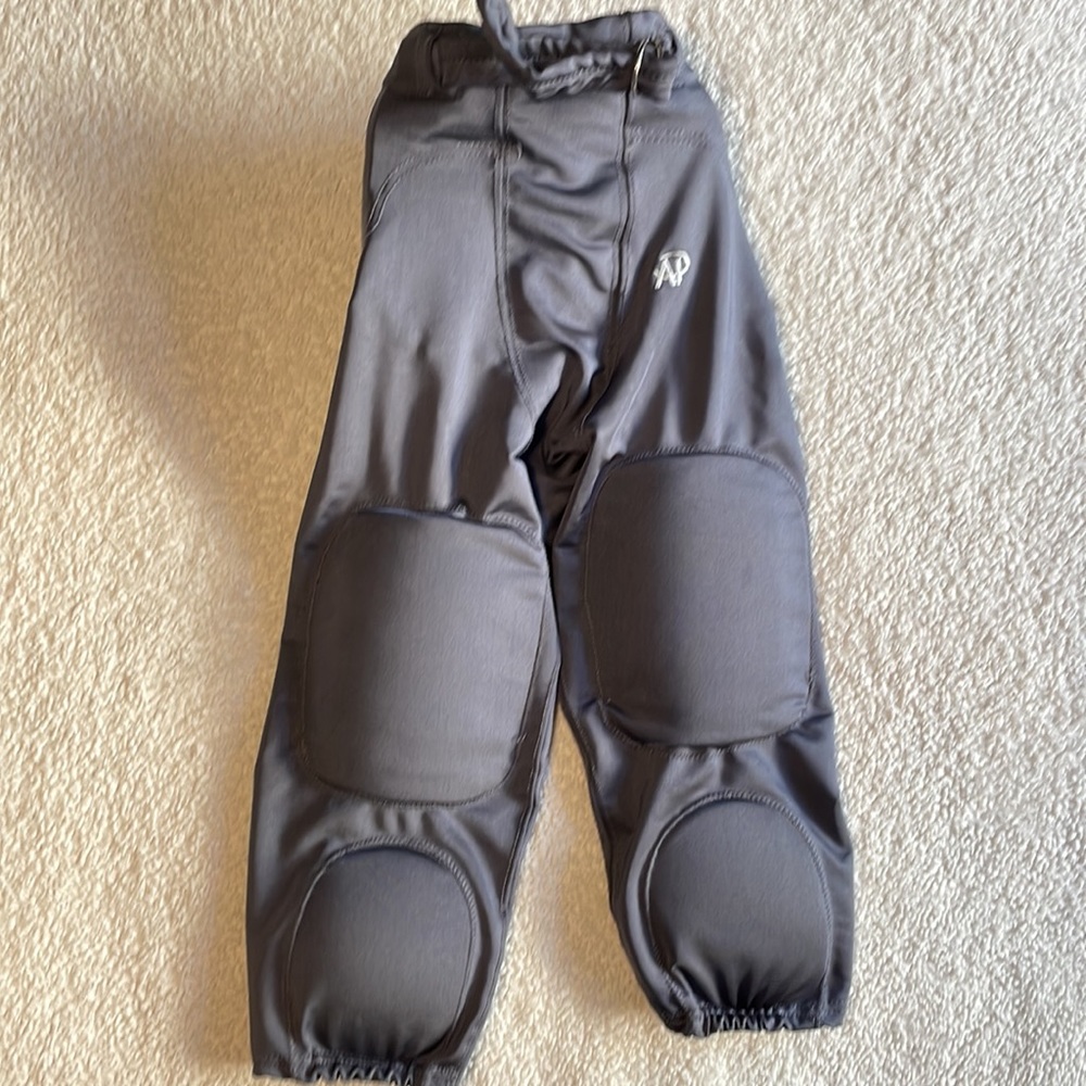Boys football practice pants. Padding attached.